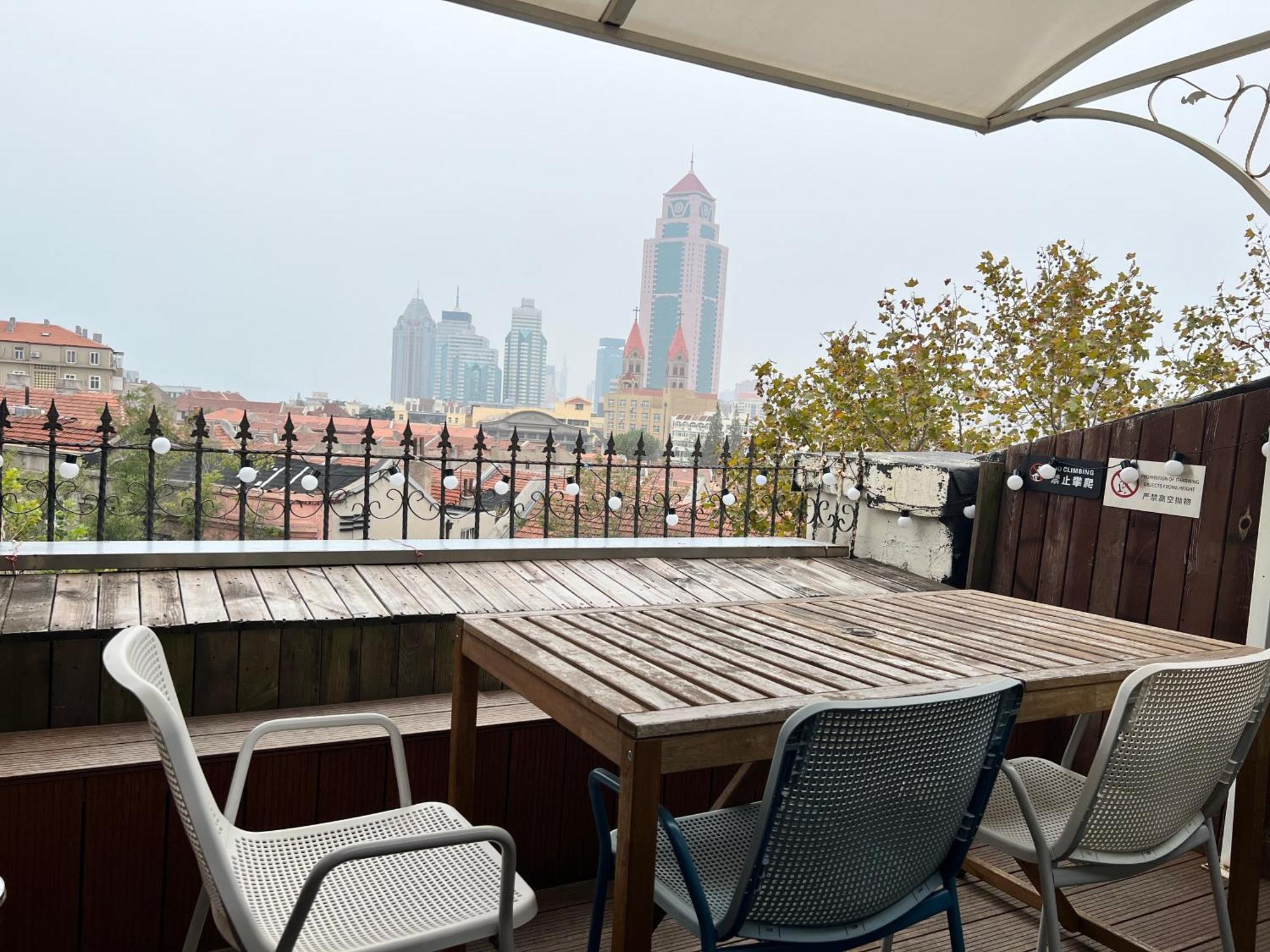 Qingdao Kaiyue Hotel Zhongshan Road St Michael'S Cathedral And Zhanqiao Pier Exterior photo